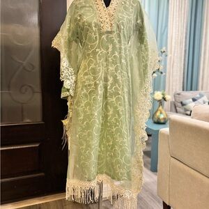 Elegant Green Embroidered Kaftan with Fringe